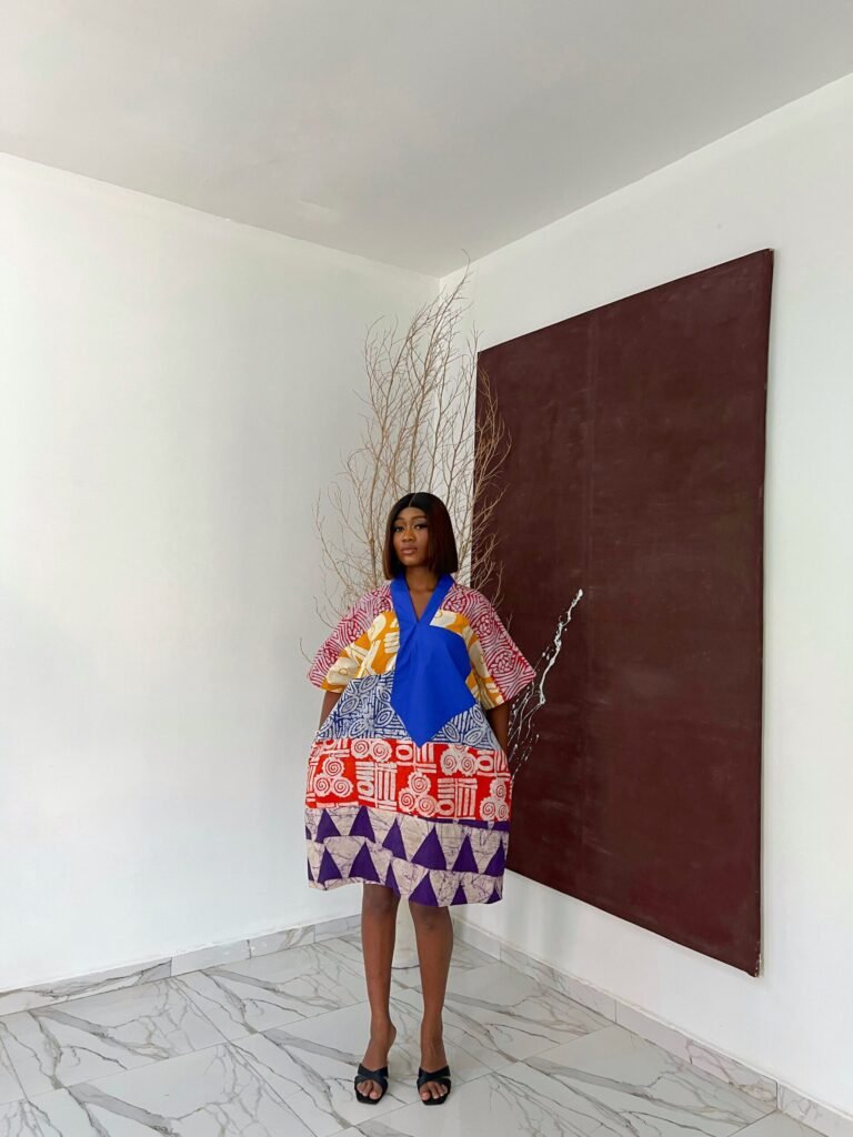 Bubu gown styles - Toke short Adire mix contemporary length traditional fabric design