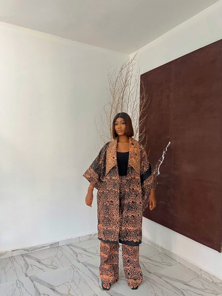 picture of a formal two piece styles for ladies showing a woman wear Belle two piece sets