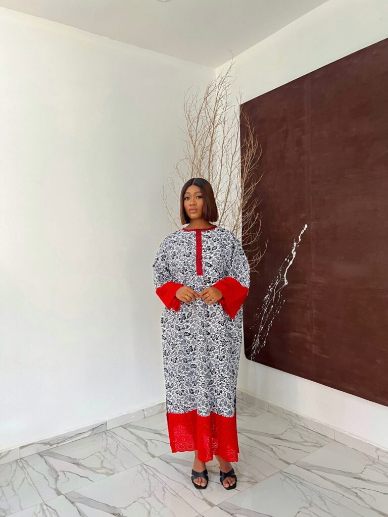 Bubu gown prices in lagos showing a woman wearing bibi lace gown made by tailoredbyadunni