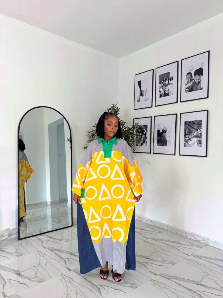 Picture of a bubu gown styles for pregnant women showing a style by Zaya made by Tailored by Adunni
