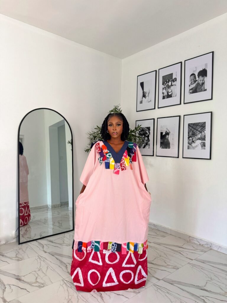 A picture of a woman wearing buy bubu gown in lagos made by tailoredbyadunni