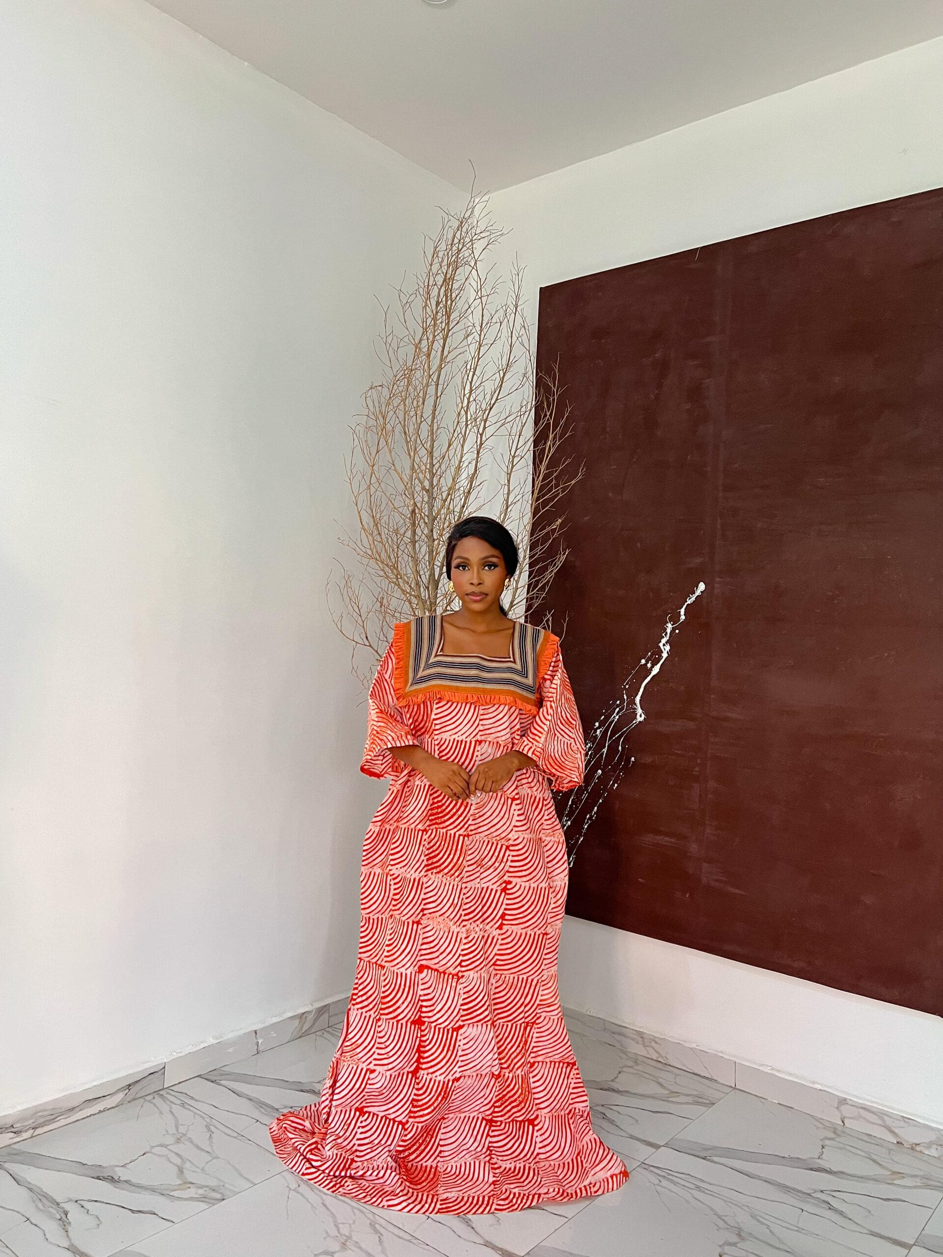 mermaid bubu dress for sale showing a picture of a woman wearing diana bubu dress made by tailored by adunni