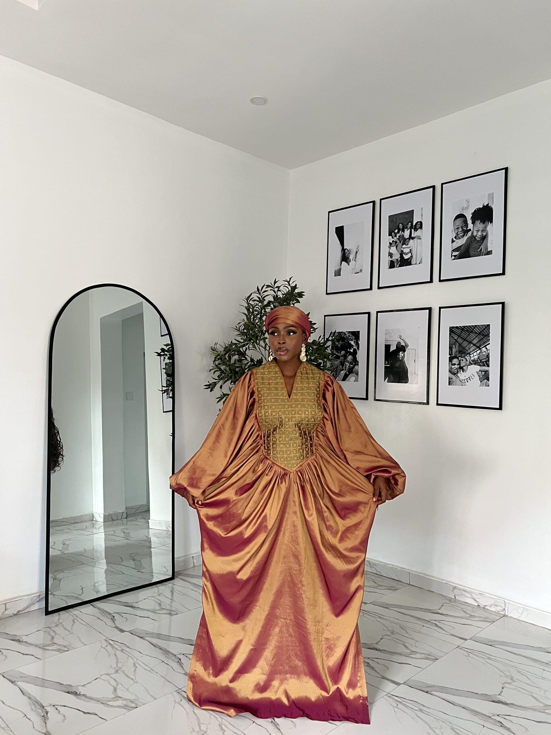 Becca Bubu embroidered bubu dress for sale showing a picture of becca bubu made by tailored by adunni